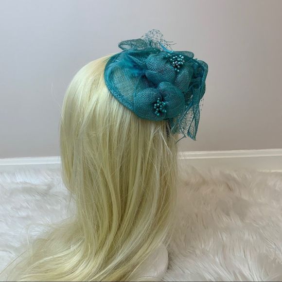 Beautiful turquoise fascinator headband for derby